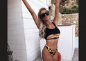 Ellie O'Donnell exposes underboob in a cut out bikini